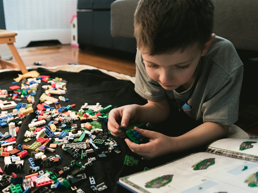 Boy building with LEGO bricks