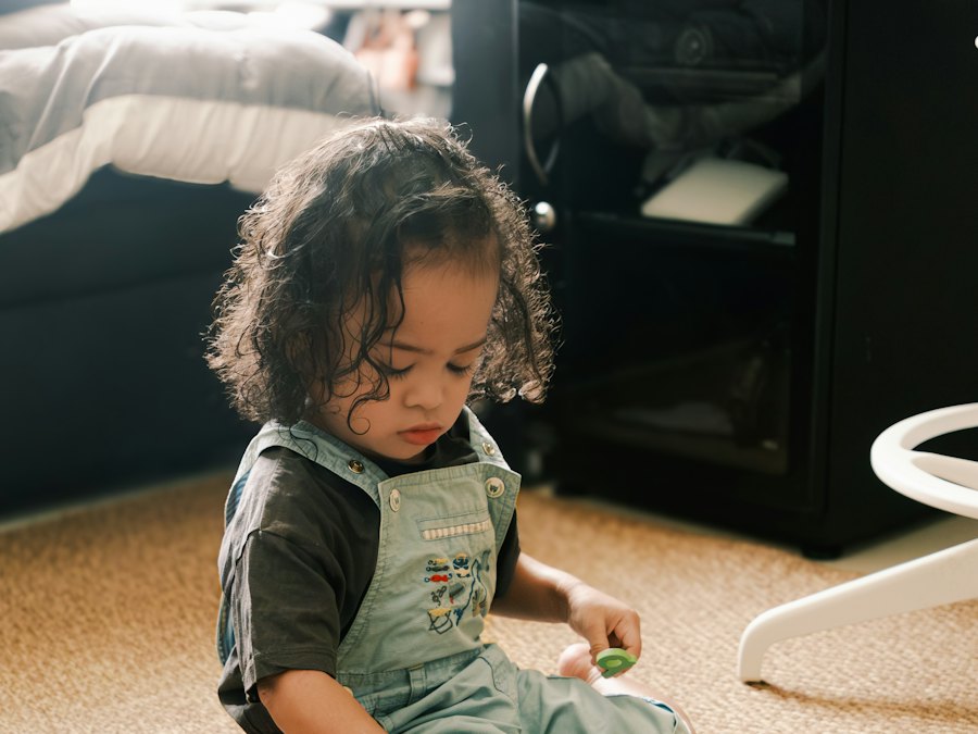 Toddler playing with an alphabet puzzle